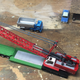 That is how 1:1 lowboy trailers actually work, the front end splits off like this.